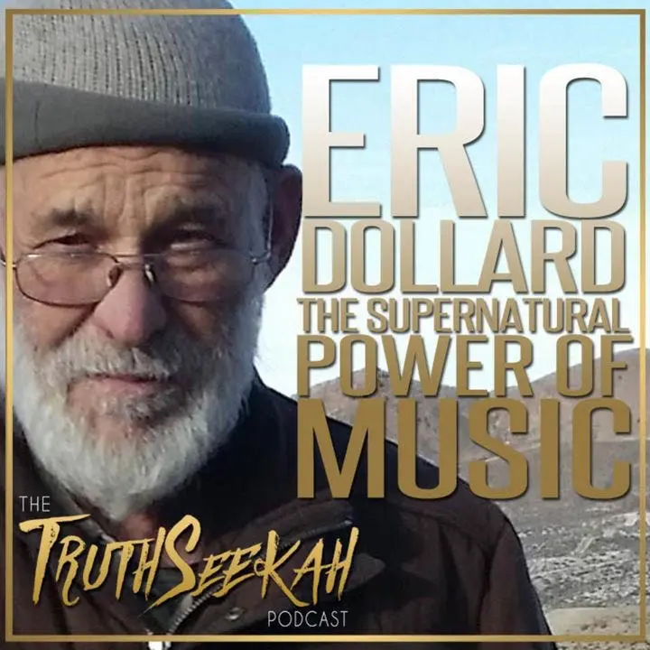 A person with a beard and glasses Description automatically generated